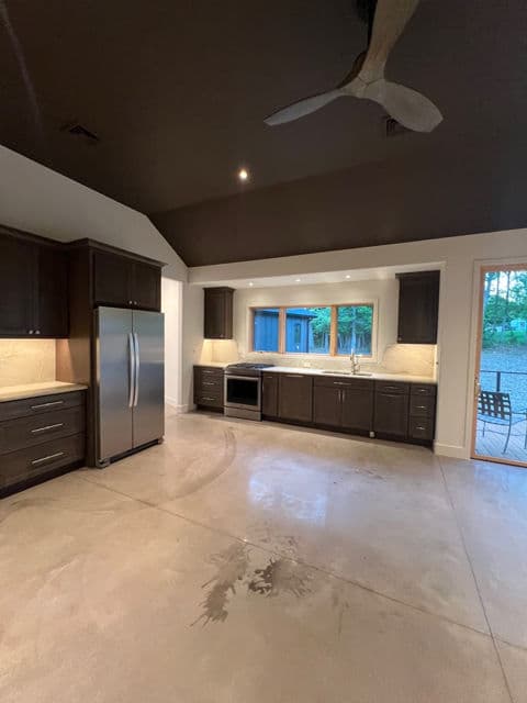 Modern Kitchen Transformation with Gleaming Finishes image